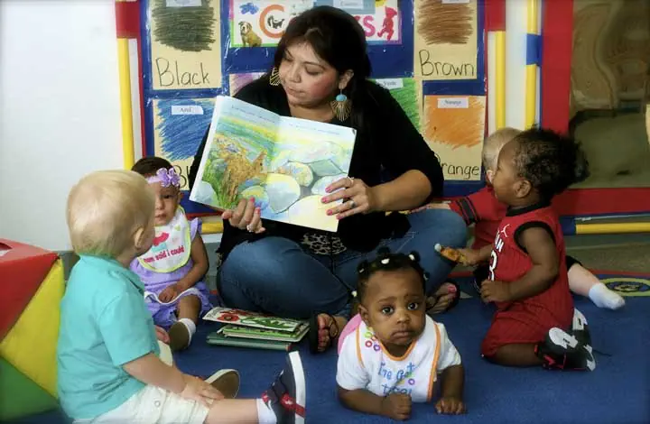 "Learning to read" Photo Courtesy of: Educational First Steps 