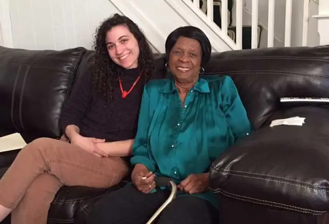 Our HUBS (Housing Upgrades to Benefit Seniors) organizer, Danielle Bouchard (left), helps connect about 100 low-income senior citizens in Baltimore to repairs and services that allow them to remain safely in their homes. Here she is shown with one of her clients, Ms. Hillery. Danielle forms bonds of trust with her clients that result in their receiving not only crucial home repairs but many government benefits to which they are entitled. Photo Courtesy of: Strong City Baltimore