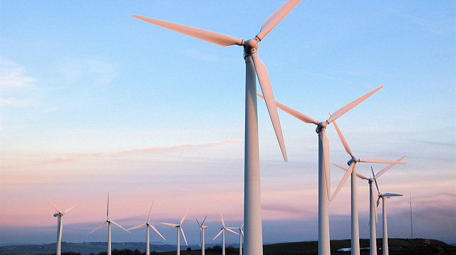"Sunset at Royd Moor Wind Farm" by Charles Cook licensed under CC BY 2.0