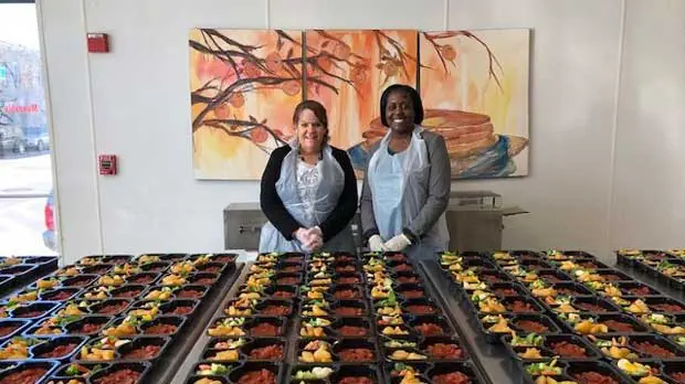 Volunteers preparing food at Moveable Feast.